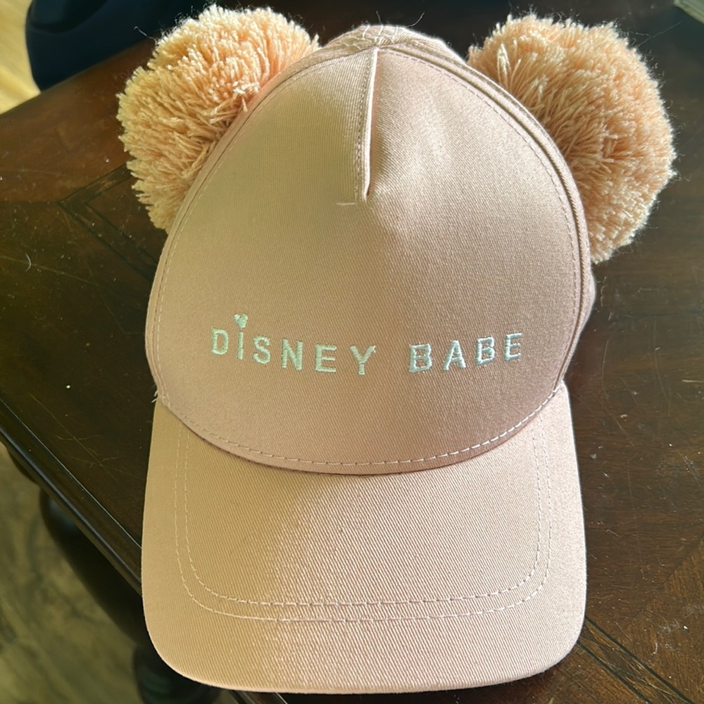 Disney Babe pink cap with pom poms